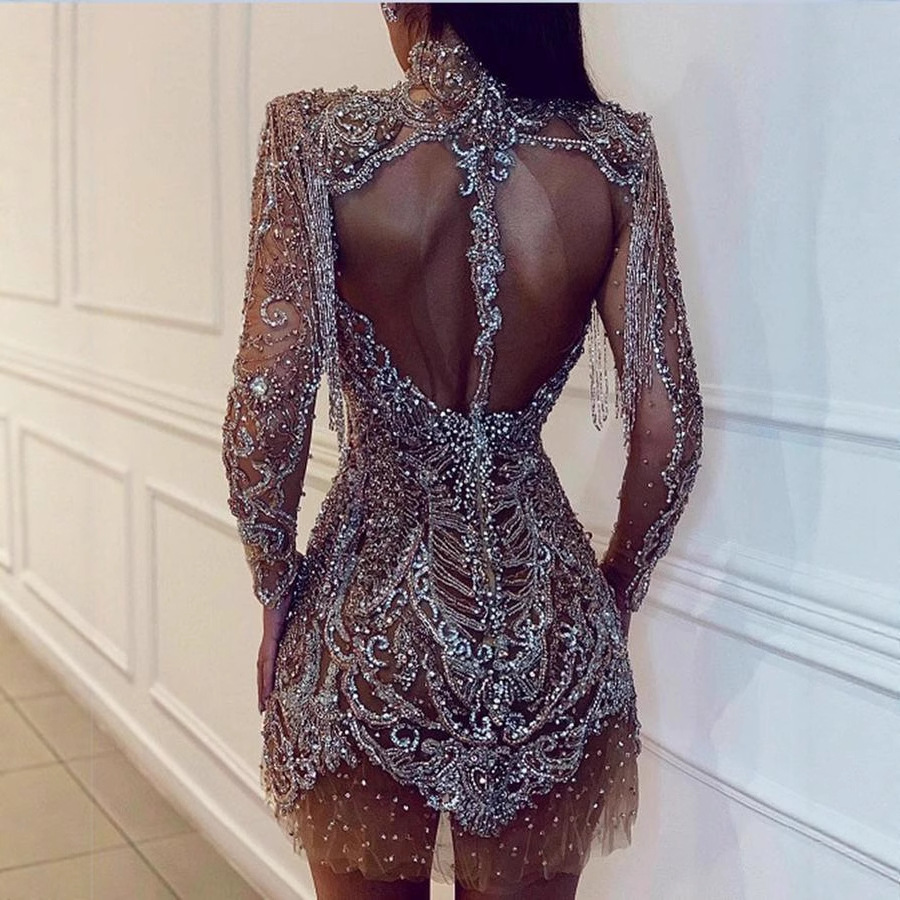 Nuevo modelo de vestido de manga larga con cuello redondo y borlas, estilo europeo y americano, con puntos dorados, para Amazon y eBay.