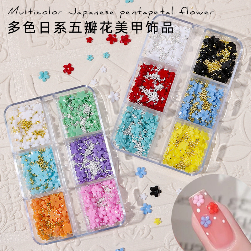 Set de joyas de manicuría de cinco pétalos colorido parches de uñas de flores tridimensionales DIY nail decoración taladro plano al por mayor