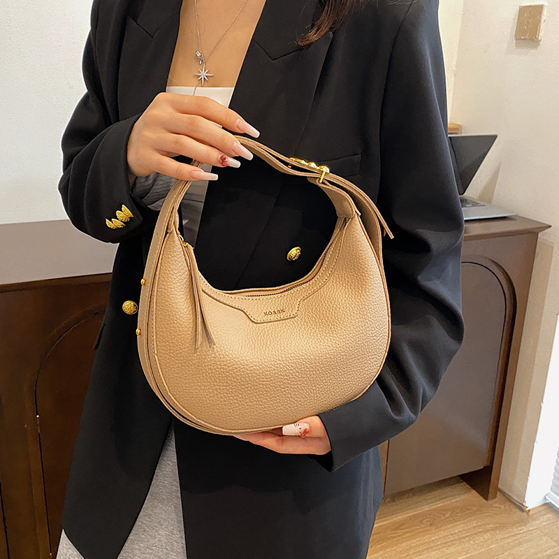 Estilo explosivo transfronterizo personalizado de fábrica, bolsa de bola de masa de nicho, nuevo bolso retro de hombro y axila de todo fósforo, bolso de mensajero
