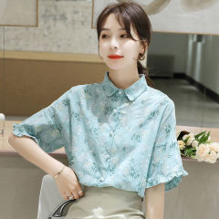刺繍の花の半袖のシャツの女性の2023夏の新型の韓国版のゆったりしているシャツのデザイン感のラッパの袖の百合の上着