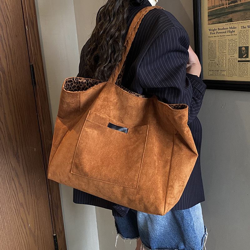 Europa y los Estados Unidos retro leopardo para hombres y mujeres bolsos de hombro bolsos de viaje de gran capacidad bolsos de mano de cacho de invierno niños bolsos de mochila