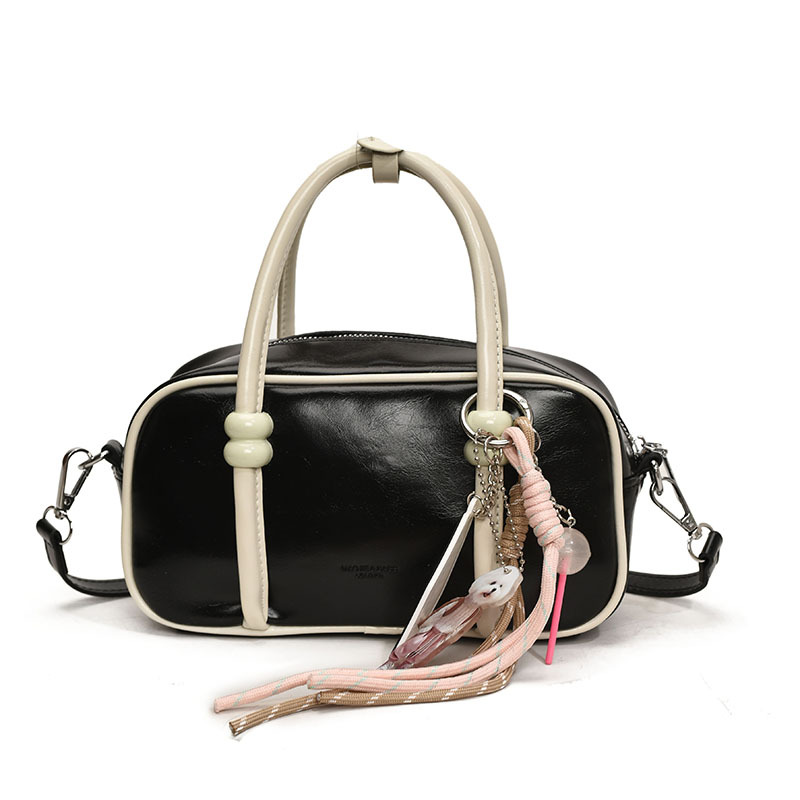 Colores contrastantes de tendencia universal bolso de bolos de mano mujer 2025 nuevo estilo de alto nivel de moda casual mochila de hombro