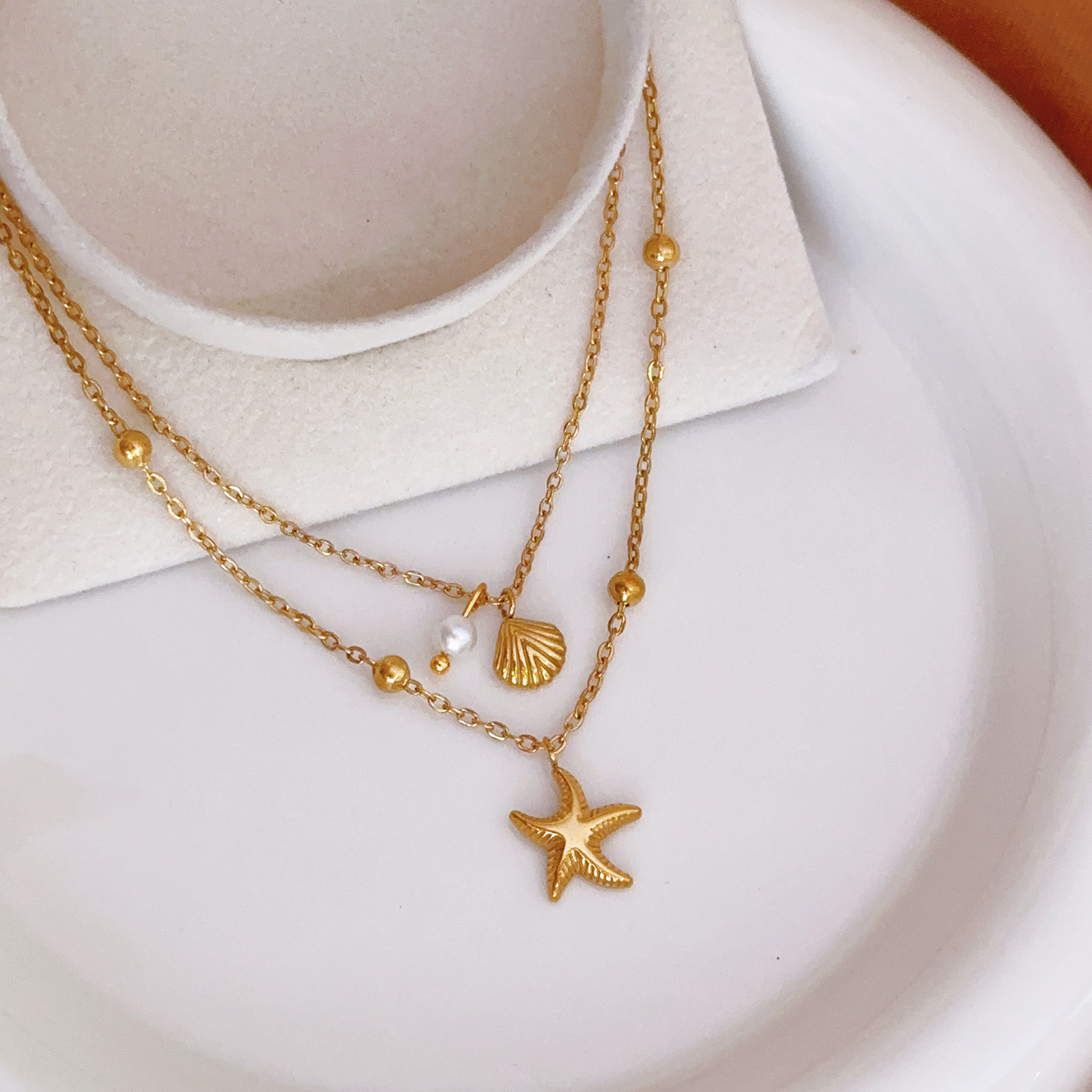 Nuevo estilo transfronterizo europeo y americano, cadena de pie de concha de estrella de mar, lujo ligero, nicho, tobillera de viento frío, joyería de todo fósforo de lujo ligero femenino