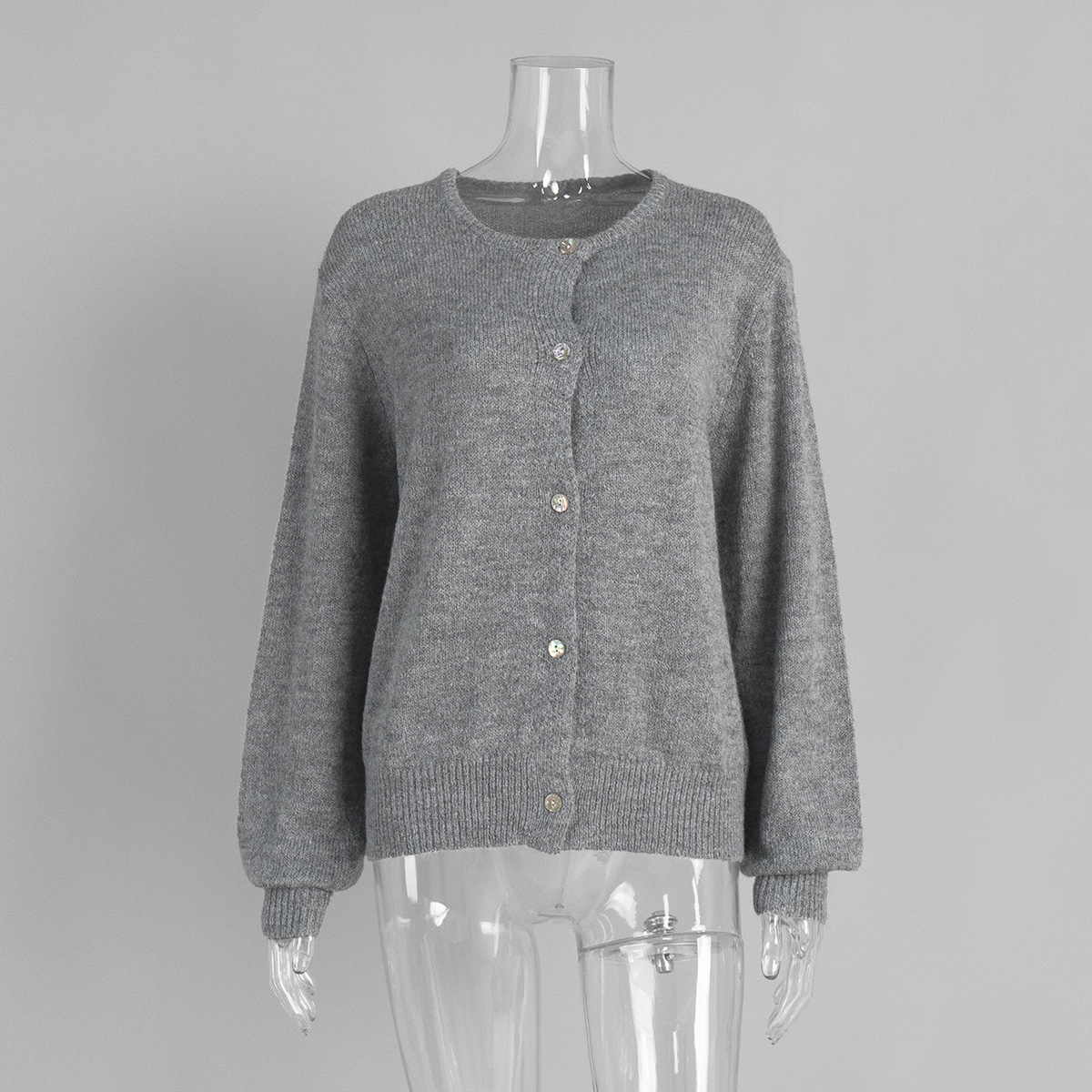 Cardigan de punto de color caramelo mujeres Europa y los Estados Unidos otoño y invierno 2025 cabello de cabello