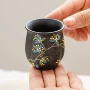 个人家用手绘陶瓷品茗杯
