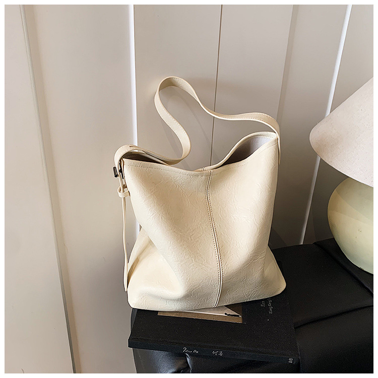 Korean style, retro, large-capacity tote bag for women, new summer 2025, versatile, fashionable, simple and solid color crossbody bag undefined