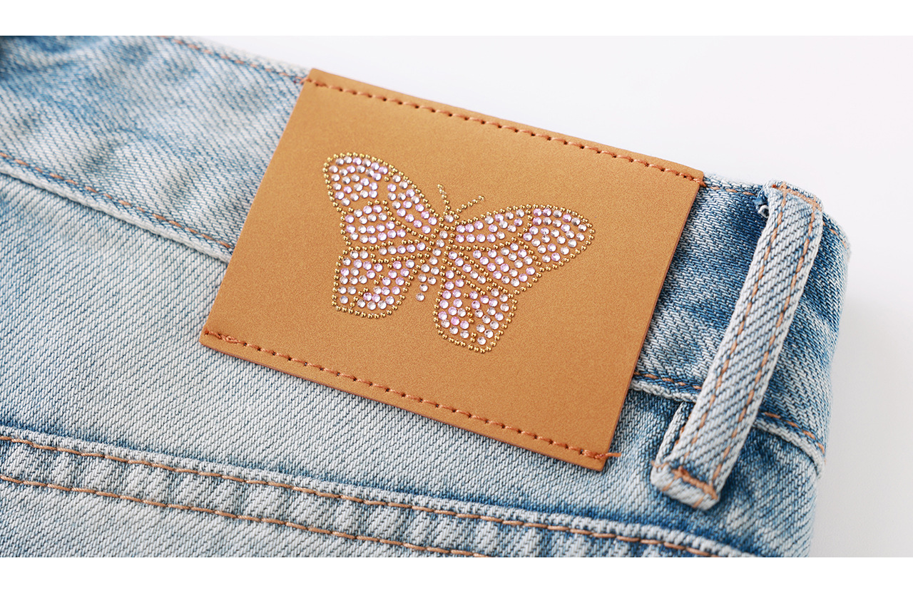 Quần jean nữ ống rộng cạp cao, chất cotton phối bướm đính đá và rách thủng — xanh lam chi tiết 30