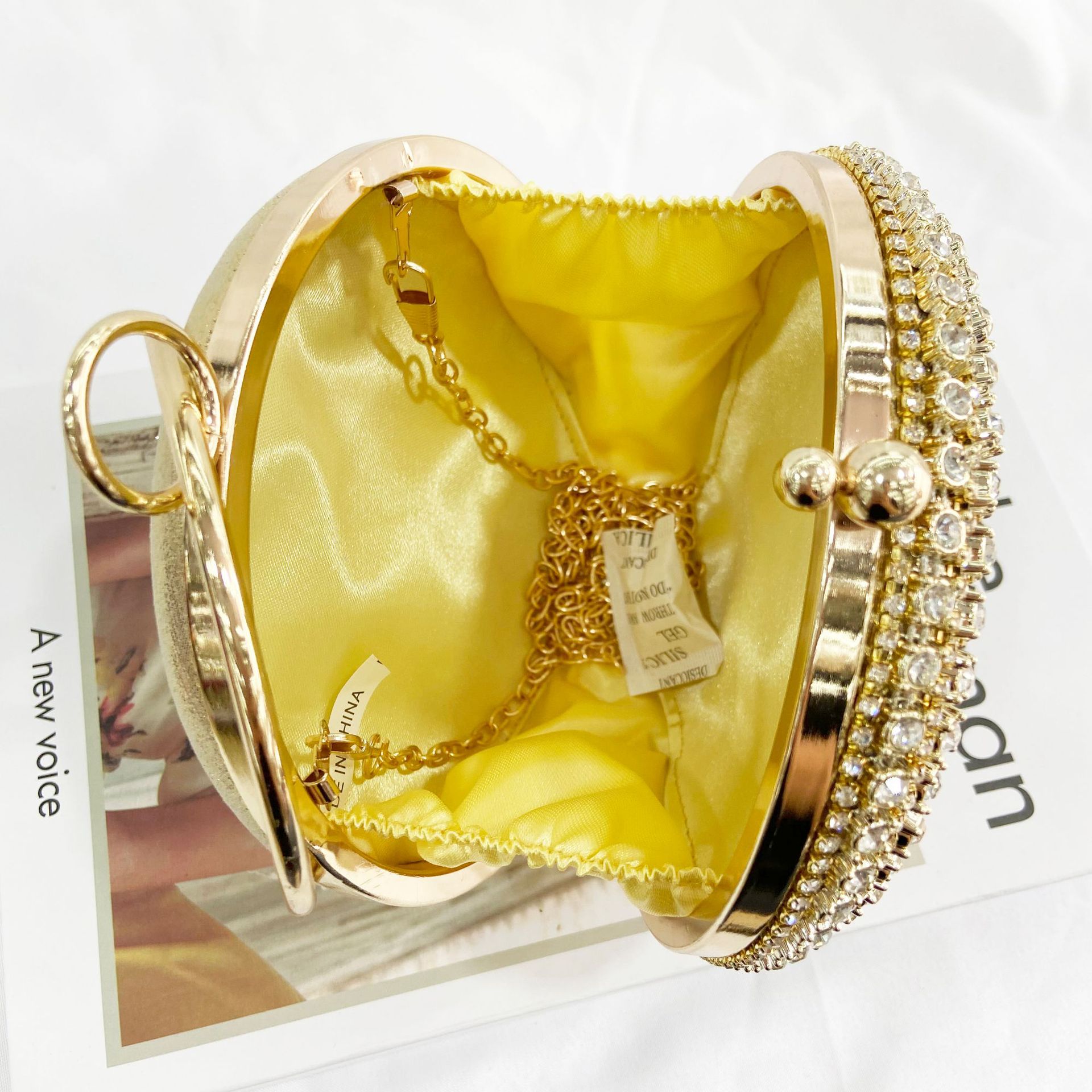 Pochette da sera vintage con bracciale e strass per donna_voghion.com