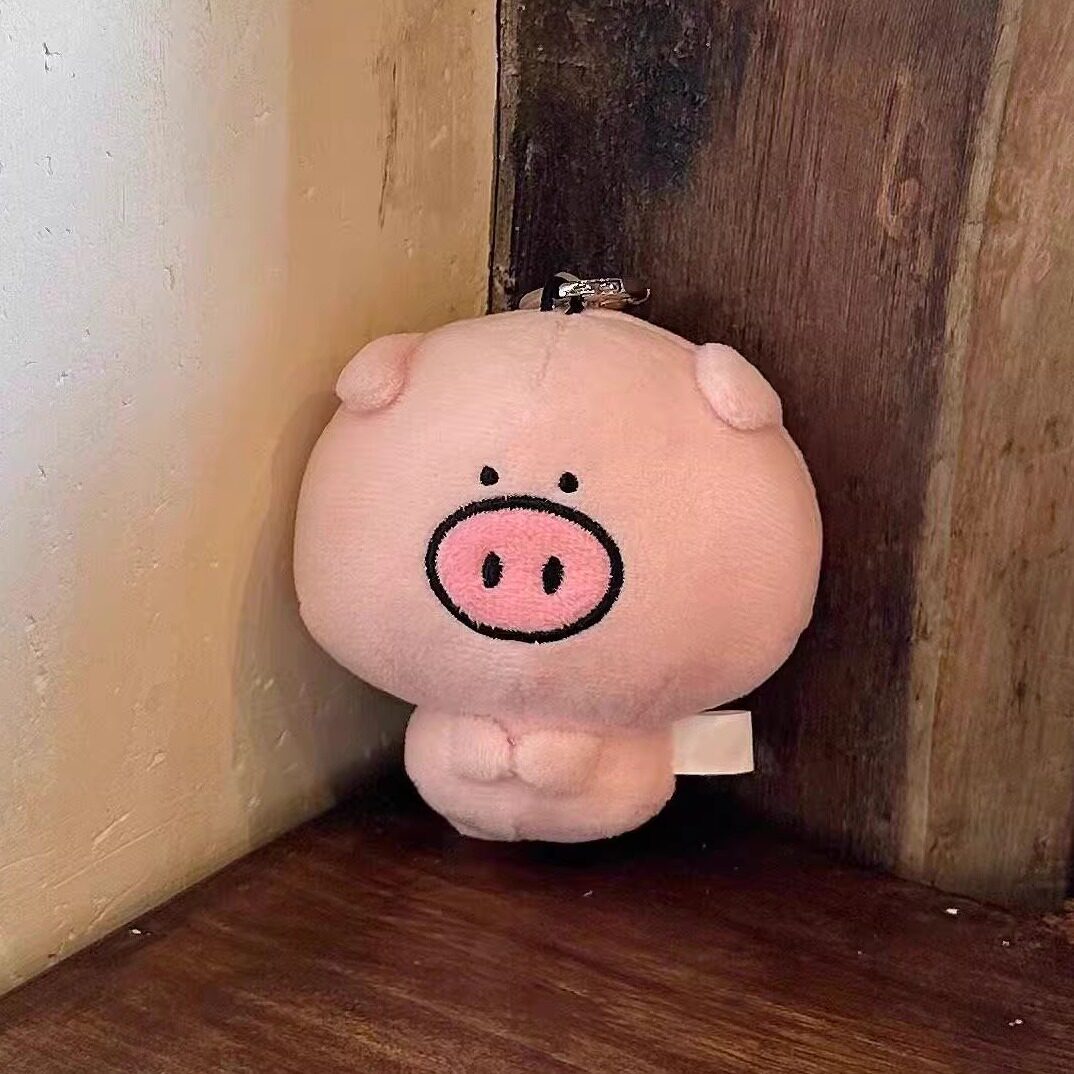 Cute piglet with big eyes holding hands plush keychain, high aesthetic value cartoon backpack pendant keychain, perfect for gifting