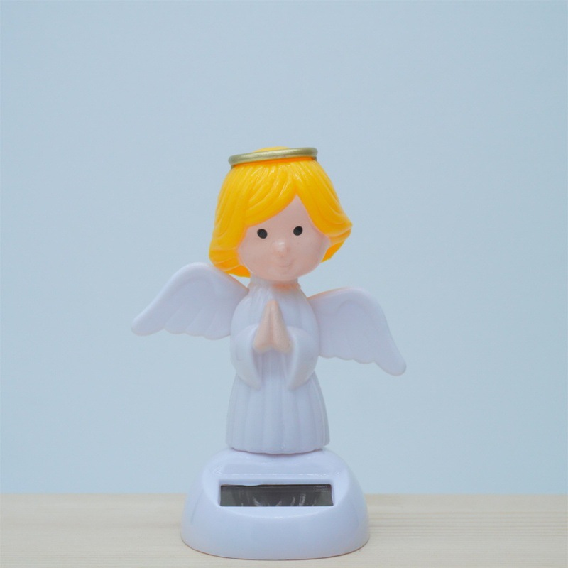 Cross-border Christmas solar energy automatic swing doll car interior shake head decorations creative car car ornaments