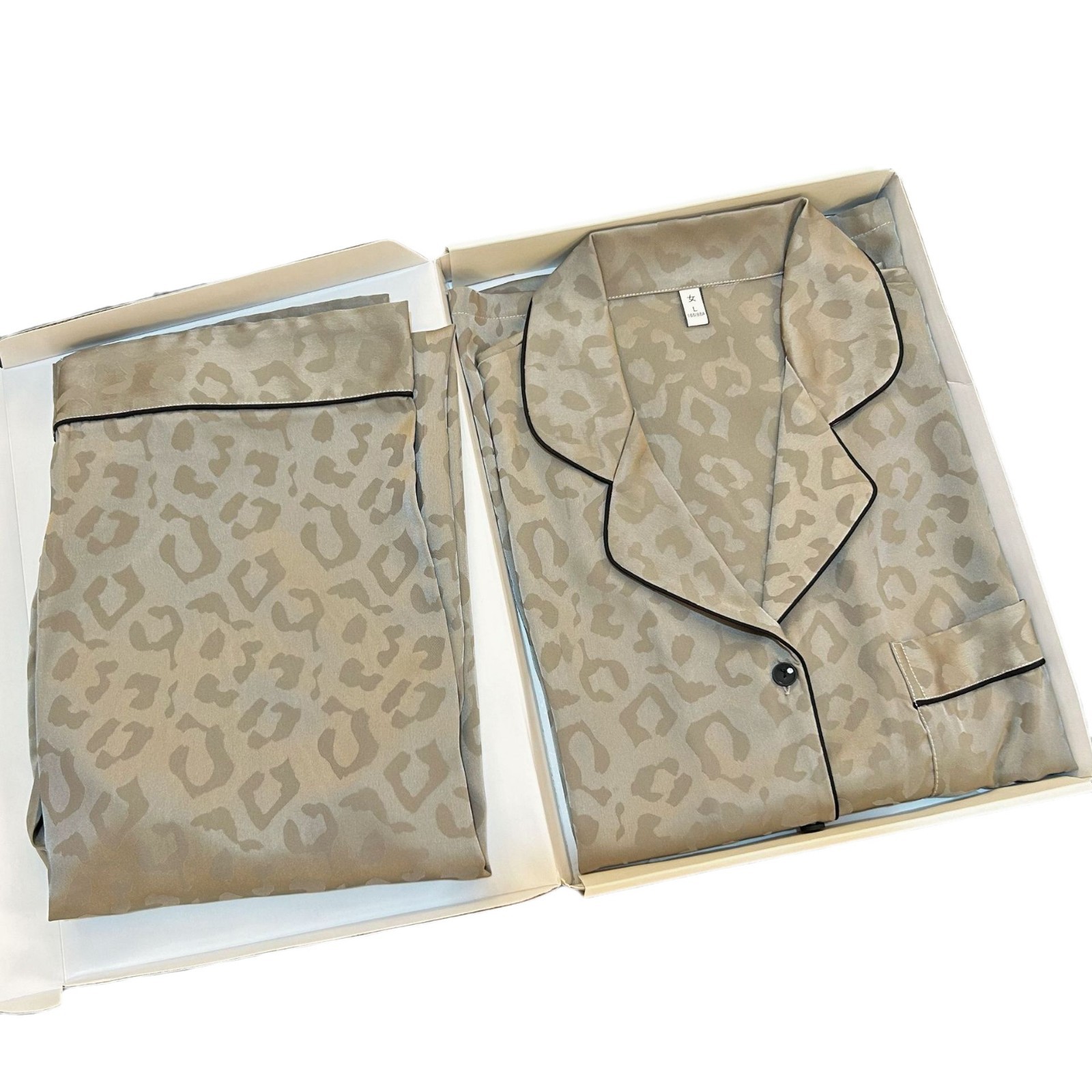 Leopardo transfronterizo jacquard seda de hielo pareja pijama set chatter comercio exterior al por mayor ropa de seda de manga larga