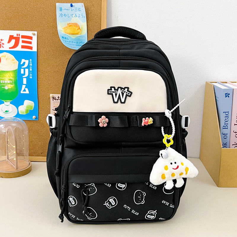 Nueva mochila de hombro simple letras negras con lindos colgantes mochila de carga mochila de gran capacidad