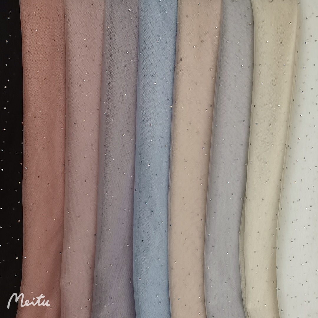 现货供应~涤36眼网纱0.3公分幻彩钻烫钻 小清新仙美网纱 裙装面料