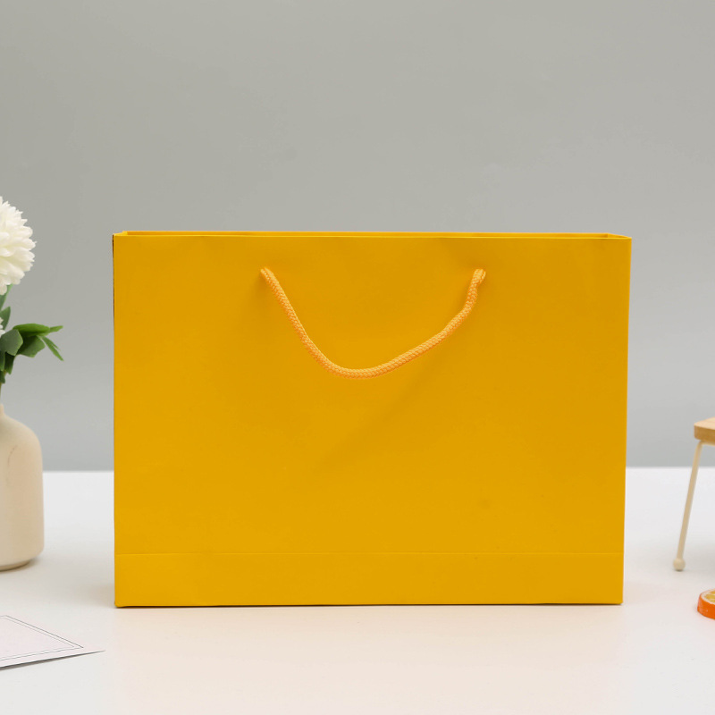 现货牛皮纸袋定做手提袋白卡覆膜礼品服装购物包装可定制加印