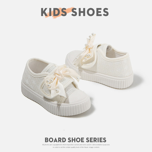 Spring and autumn children's canvas shoes with soft soles and soft surfaces, girls 'skate shoes, bow, pearl velcro, baby fashion