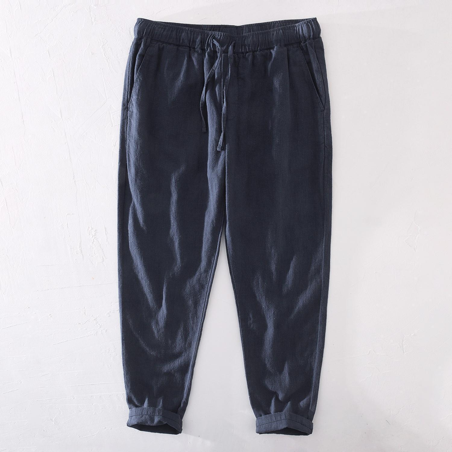 Pantalones casuales de lino rectos de algodón y lino con cintura elástica retro extremadamente cáñamo pantalones de lino sueltos de todo fósforo con cordón para hombres