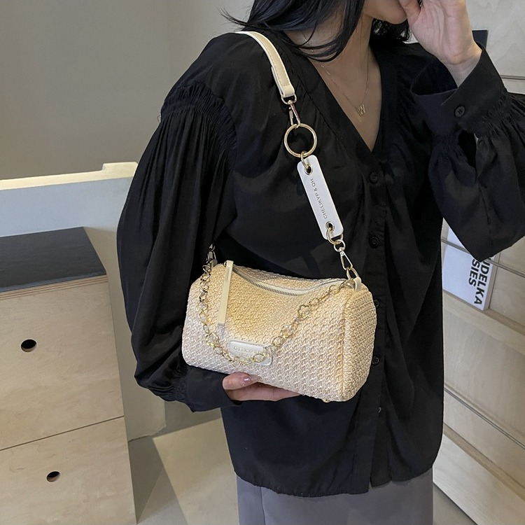 Nicho de diseño sensación de bolso de paja para mujeres verano 2024 nuevo popular bolso de cadena de hombro bolso de brazo