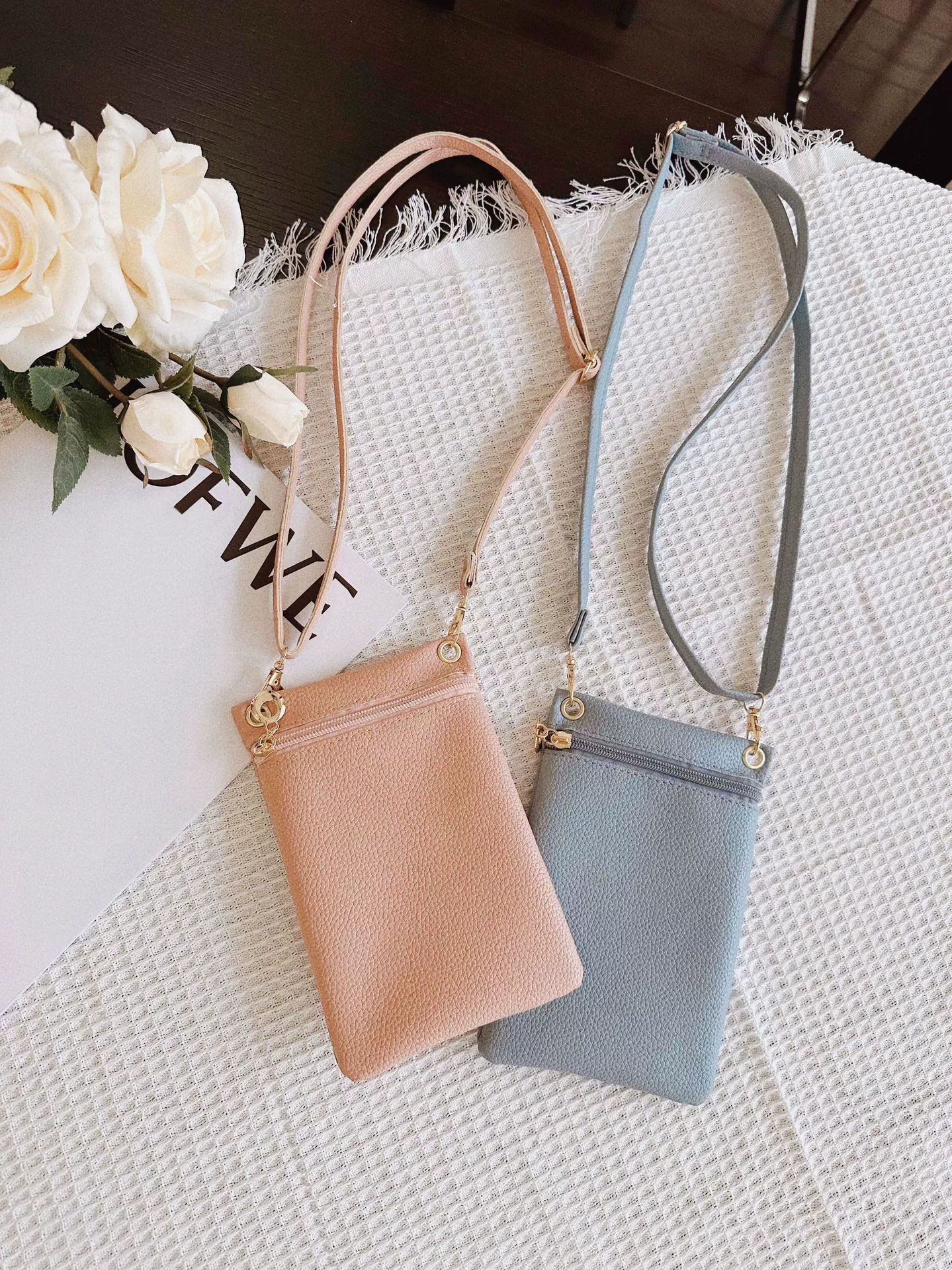 Sınır ötesi sıcak satış 2024 sonbahar ve kış yeni hakiki deri kadın çantası mini crossbody çanta basit küçük kare çanta yumuşak inek derisi cep telefonu çantası