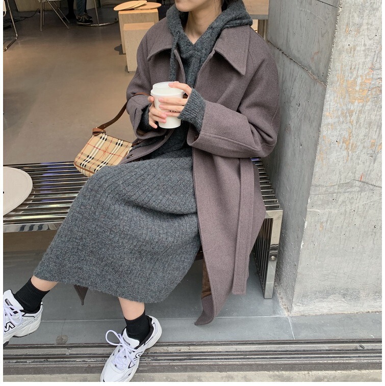 帽子のセーターのワンピースの女性の秋冬の厚いまっすぐな筒のゆったりしている腰の長いタイプの外は明らかにやせているニットのスカートを着てスカートを打ちます。|undefined