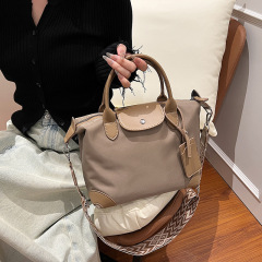 高級感尼龍布手提餃子包包女2024跨境新款中號輕便防水單肩斜挎包