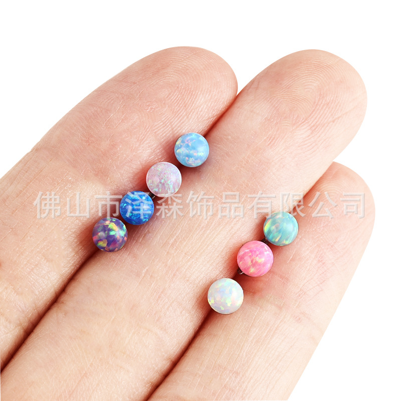 Silver pointed spike labret stud material detail