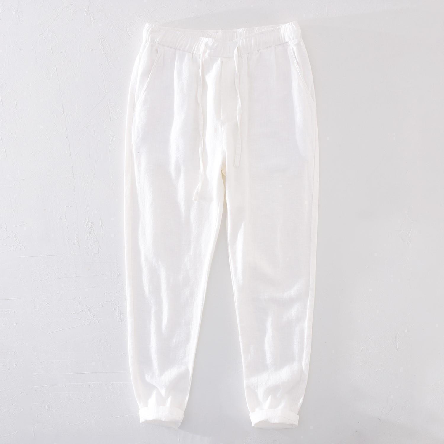 Pantalones casuales de lino rectos de algodón y lino con cintura elástica retro extremadamente cáñamo pantalones de lino sueltos de todo fósforo con cordón para hombres
