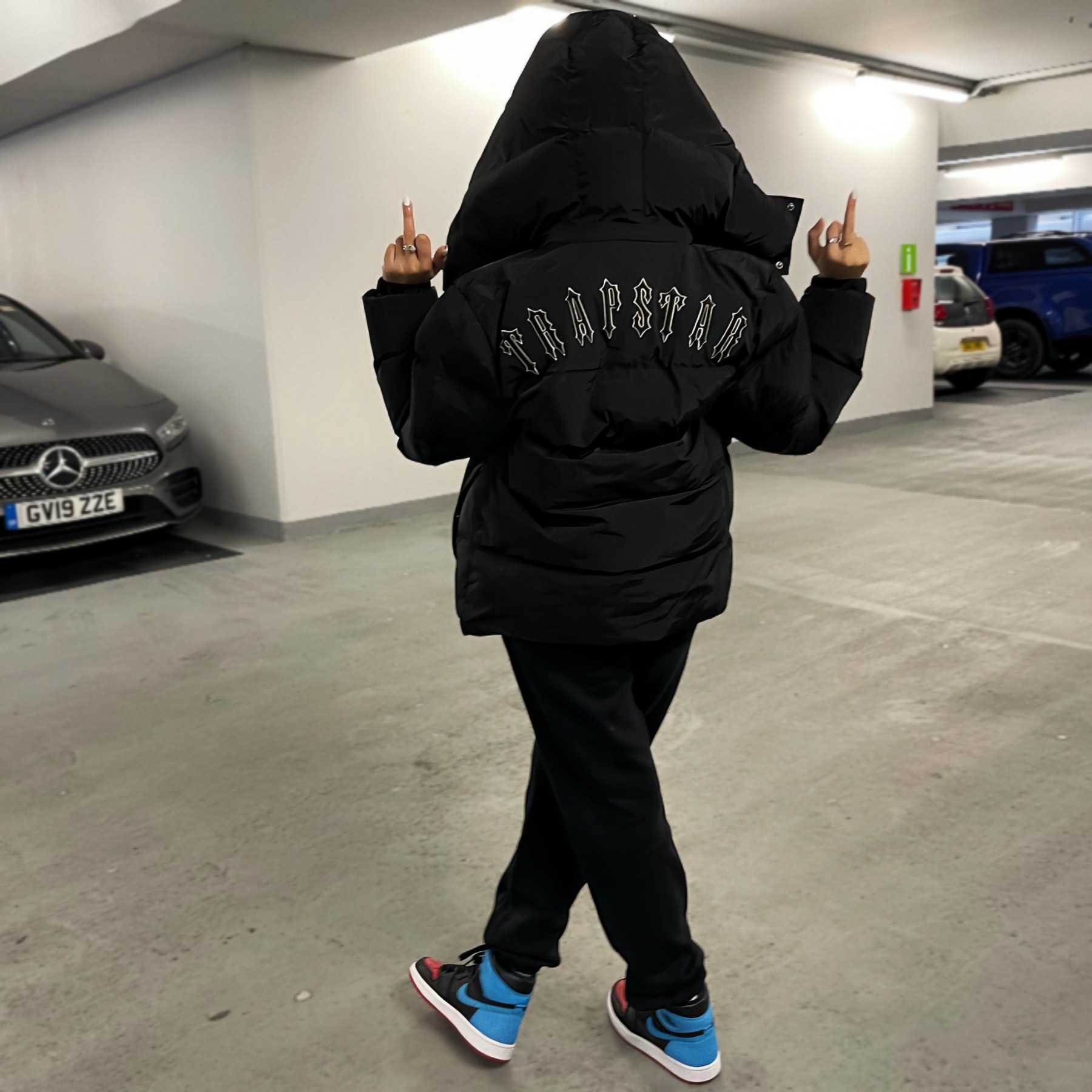 Versión correcta de la chaqueta de algodón de la calle americana TRAPSTAR con bordado de letras detrás de la chaqueta cálida de invierno de hip-hop de la costa oeste
