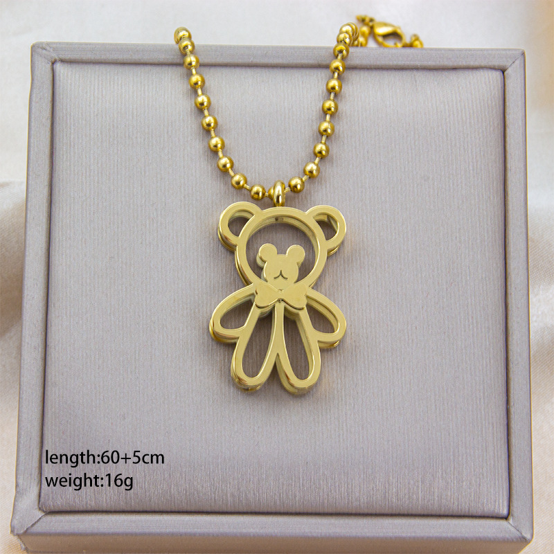 Transfronterizos de doble cara cuadrícula oso impresión ligera collar de lujo nicho femenino diseño sensación cadena de suéter de acero de titanio al por mayor image 3