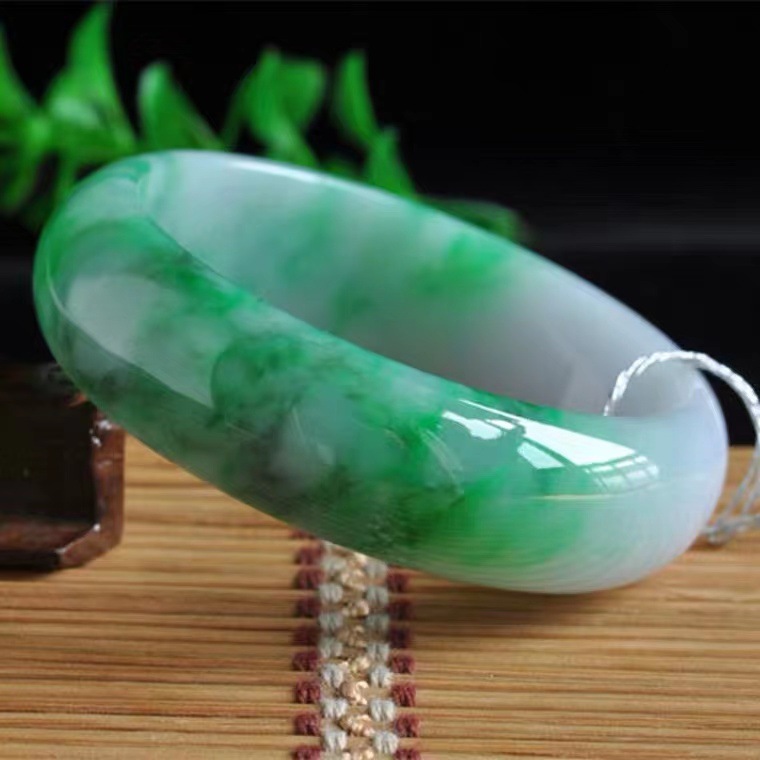 Xiaoting Myanmar spring color jade bracelet ice light green floating flower wide version of the round Wanfu true jade bracelet female ice species Xiaoting Myanmar spring color jade bracelet ice light green floating flower wide version of the round Wanfu true jade bracelet female ice species