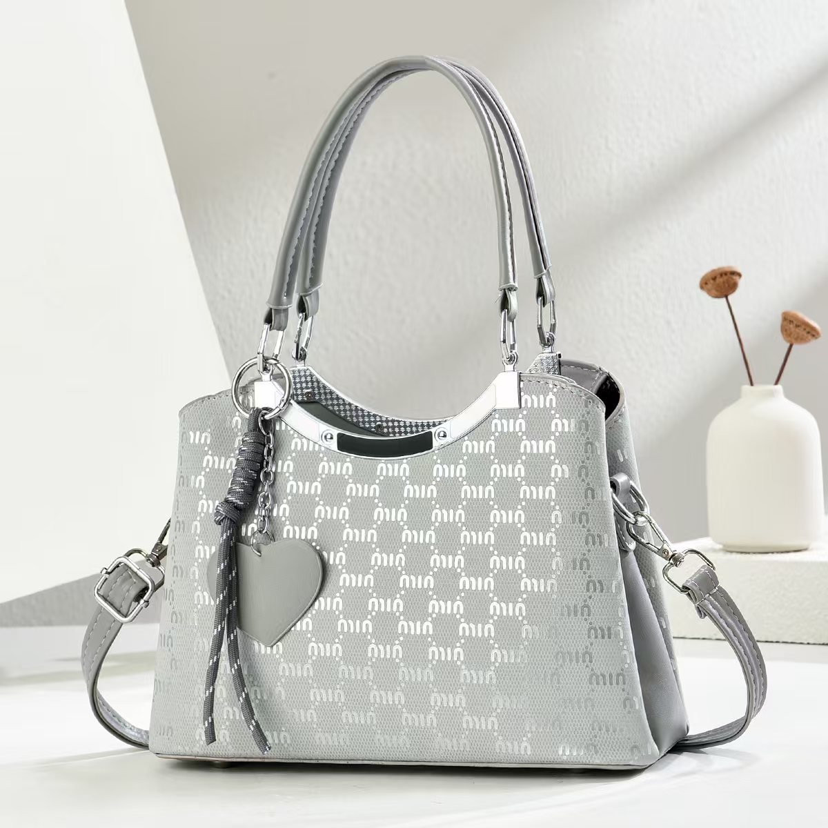 Marca de gran capacidad bolso tote francés nuevo temperamento femenino bolso femenino de moda europea y americana bolso de hombro de viaje de compras de ocio
