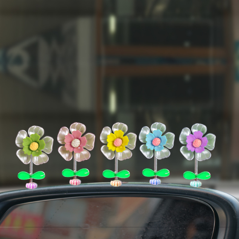 Decoraciones de automóviles 2023 nueva consola central de flores de conchas frescas sacude la cabeza adorable decoración de flores pequeñas
