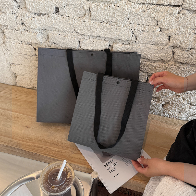 衣料品店不織布ハンドバッグ厚みのあるウェビング女性の服ギフトショッピング包装袋ギフトバッグ卸売|undefined