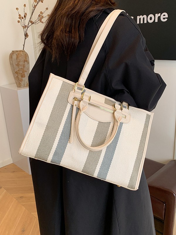 Cross-border color contrastante estriado bolso de mano casual para mujeres 2024 Amazon nueva moda de gran capacidad mochila de viaje