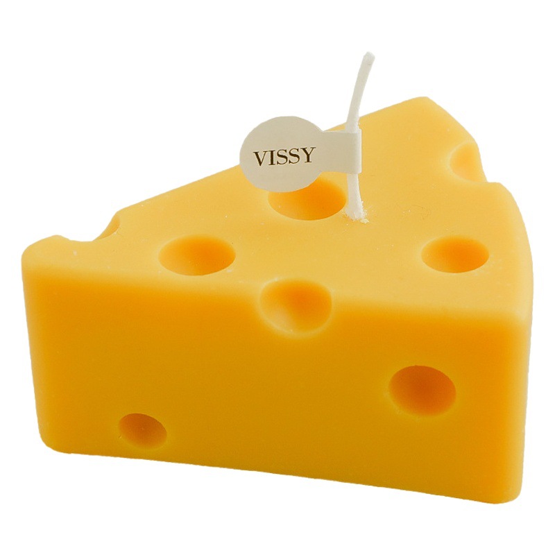 Vela aromática artesanal con forma de queso