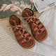 Thick soled Roman sandals for women's summer 2024, new retro cross straps for wearing flat bottomed beach shoes, oversized women's shoes