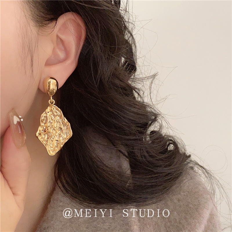 Foreign trade metal geometric pleated pendant cold wind earrings women's high sense of niche fashion street racket earrings wholesale tide