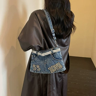牛仔布包包女2026新款时尚皮带装饰单肩斜挎包大容量通勤托特包