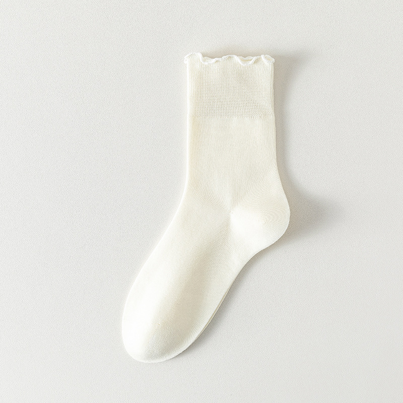 Calcetines de algodón de color sólido para mujeres verano en una máquina sin costuras de hueso envasado independiente calcetines de mujer al por mayor