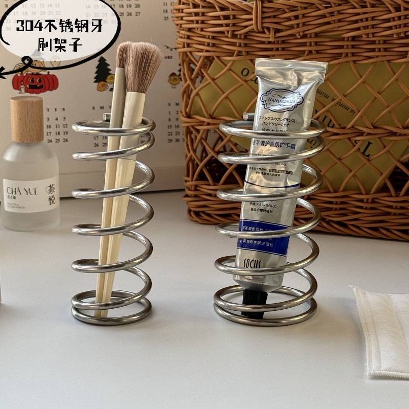 304 stainless steel metal toothbrush holder simple desktop storage bathroom drain storage makeup brush high-end hollow rack