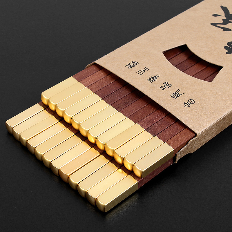 Palillos de madera de ala de pollo del hogar palillos de cabeza de oro en caja niebla oro sándalo rojo palillos chinos palillos restaurante letras en stock al por mayor