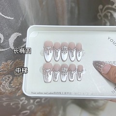 奈姿手作業で甲春夏の新指先城ジルコンフランス猫眼高級卸売りネイルシールを身に着けている