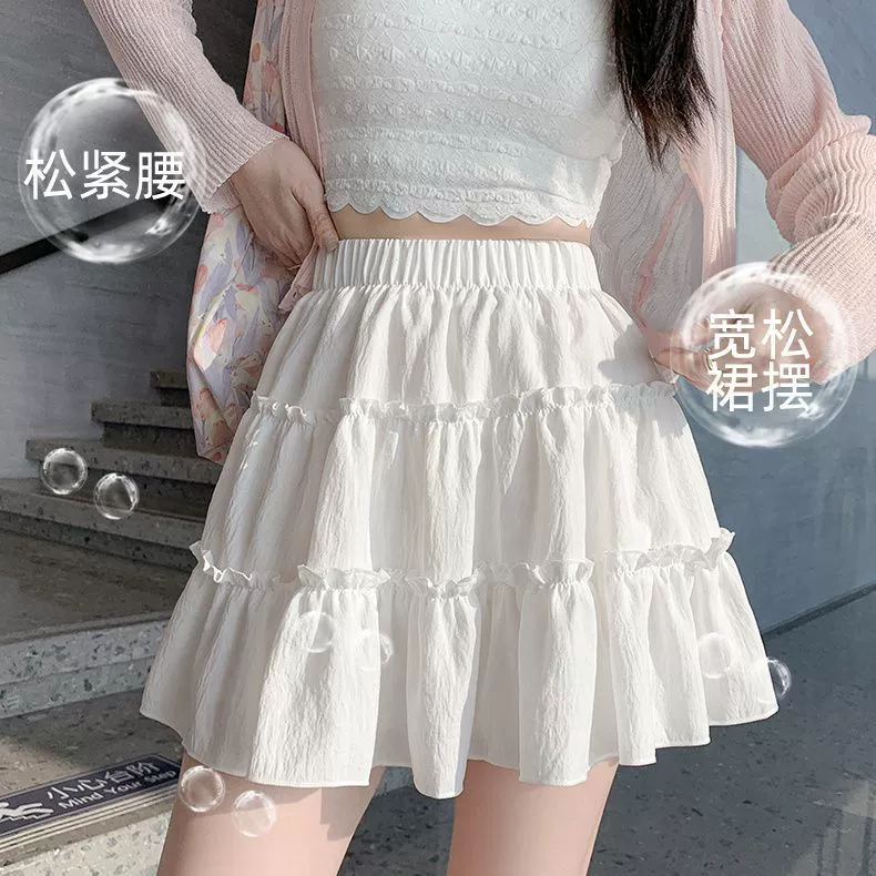 2024 короткая юбка трапециевидной формы, летняя новая стильная маленькая утягивающая юбка с высокой талией, милая юбка с грибком, чтобы предотвратить экспозицию