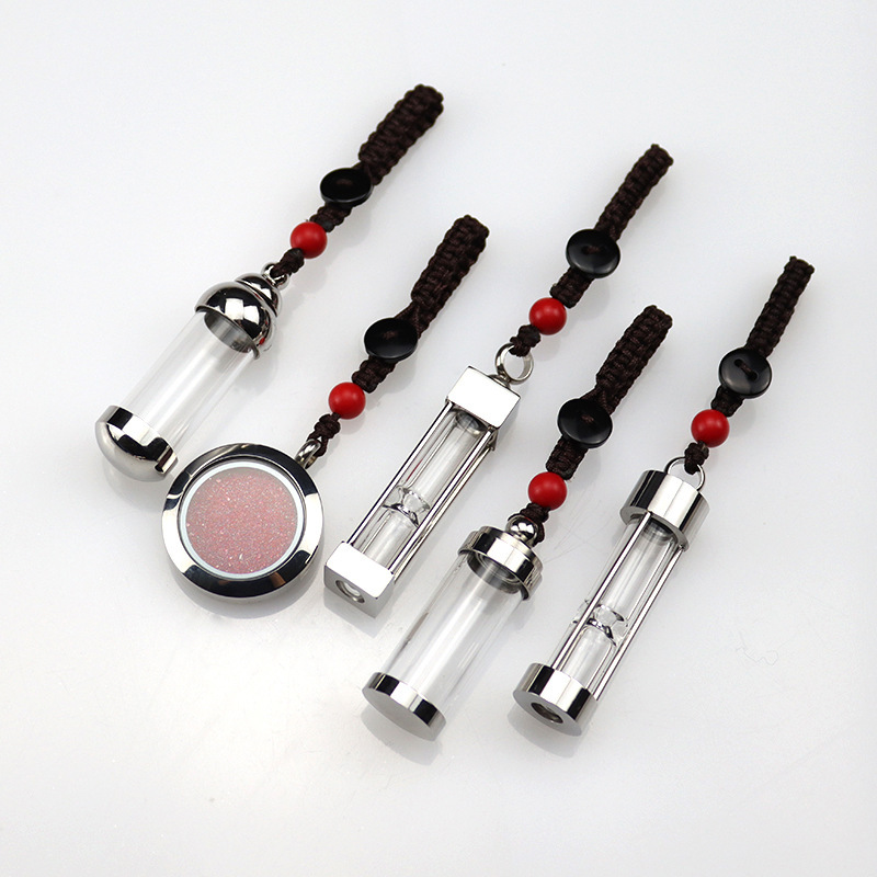 Can be opened with cinnabar hollow bottle stainless steel gawu box key chain small glass bottle men and women carry cinnabar bottle