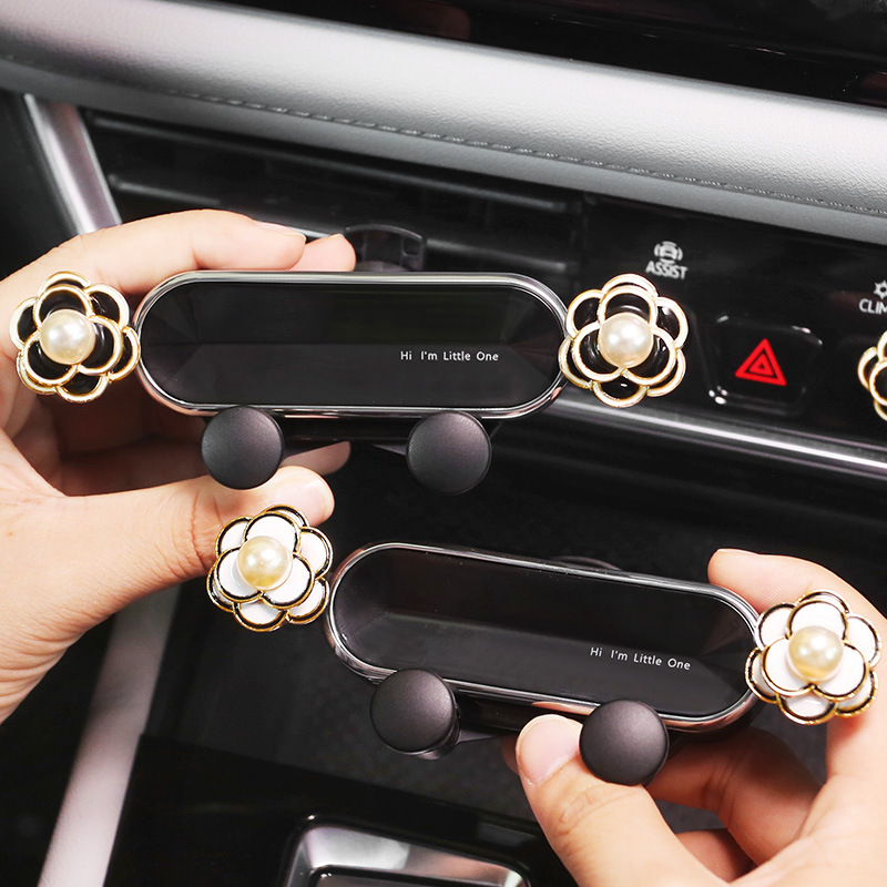 Car mobile phone holder cute high-end camellia car navigation bracket creative car air outlet fixing artifact for women