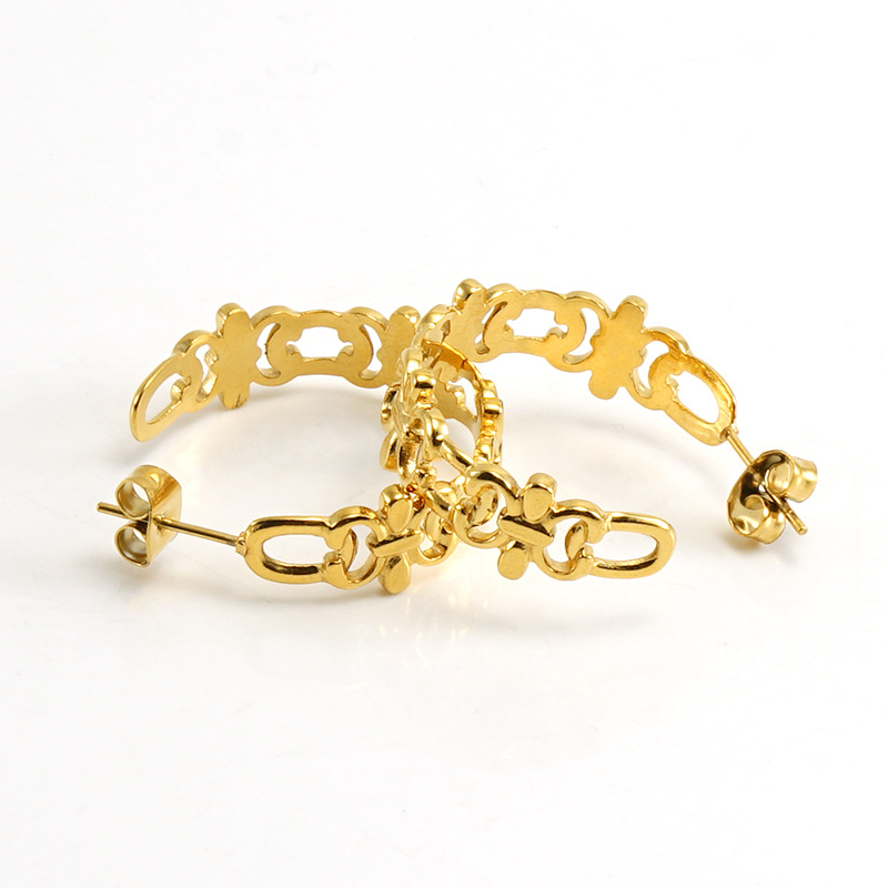 Pendientes de acero inoxidable europeos y americanos transfronterizos, personalizados, de diseño hueco, estilo retro de lujo ligero, de acero titanio y oro de 18k para mujer.