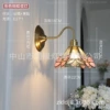 Fuchsia brass sconce