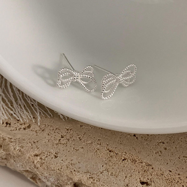 Retro elegant fashionable trend earrings with pigtail with bow