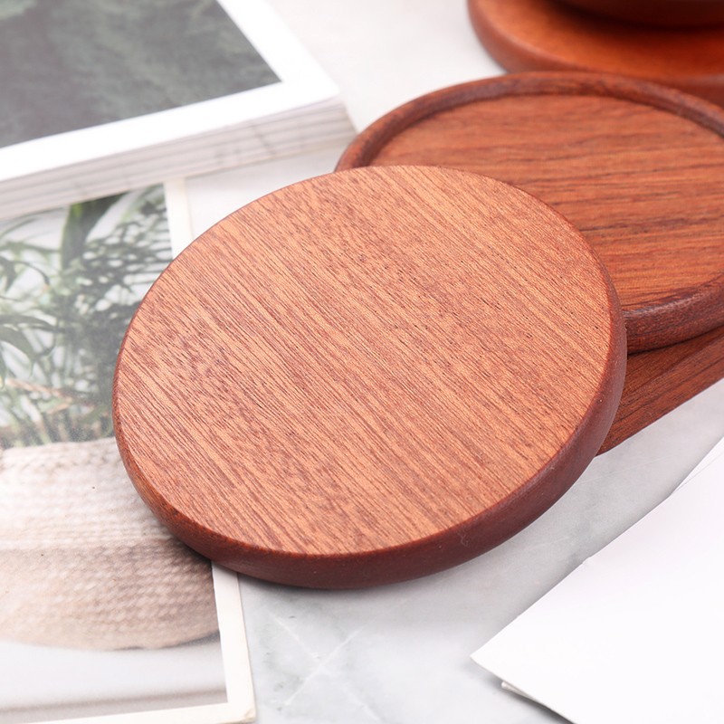 Planos redondos de árbol de ébano (10 cm)