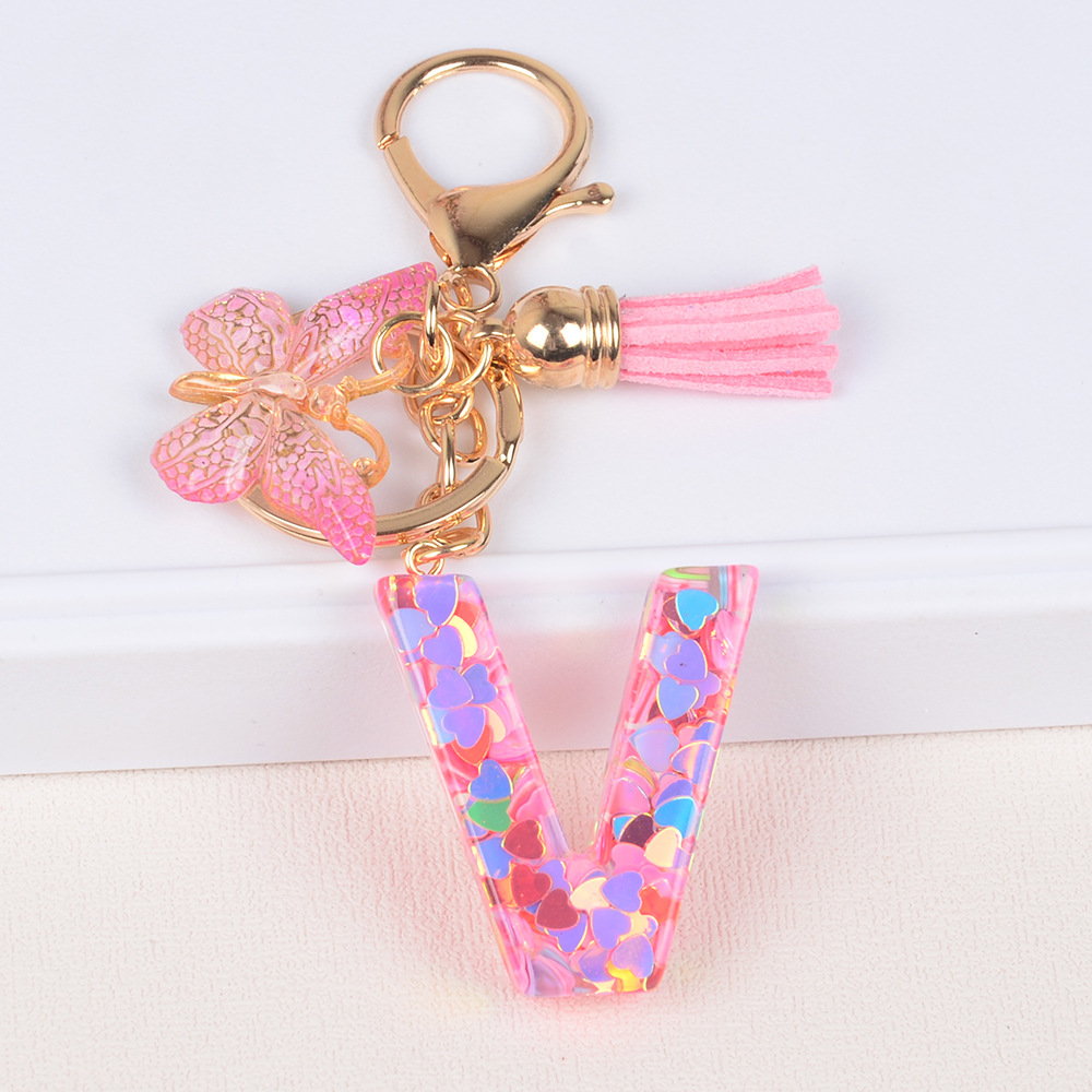 Explosiones transfronterizas amor sequillas iniciales llavero al por mayor resina letra mariposa fringe llavero se puede personalizar