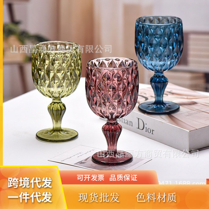 Glass engrosado color relieve taza de tinta fabricantes al por mayor taza de vino alto pie taza de vino casero taza de jugo